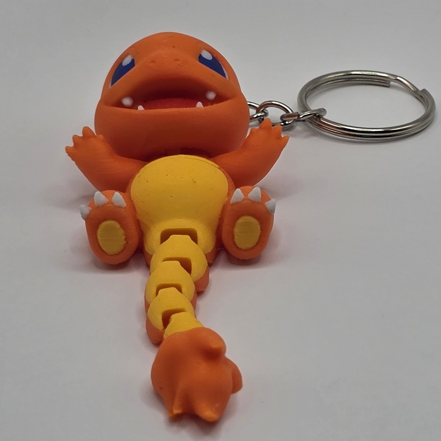 Cute Articulated Charmander Keychain | 3D Printed Fire Lizard Keychain | Pocket Monster Inspired Backpack Charm | Cute Gamer Gift | Fantasy Creature Accessory - SkeletonEarth Designs